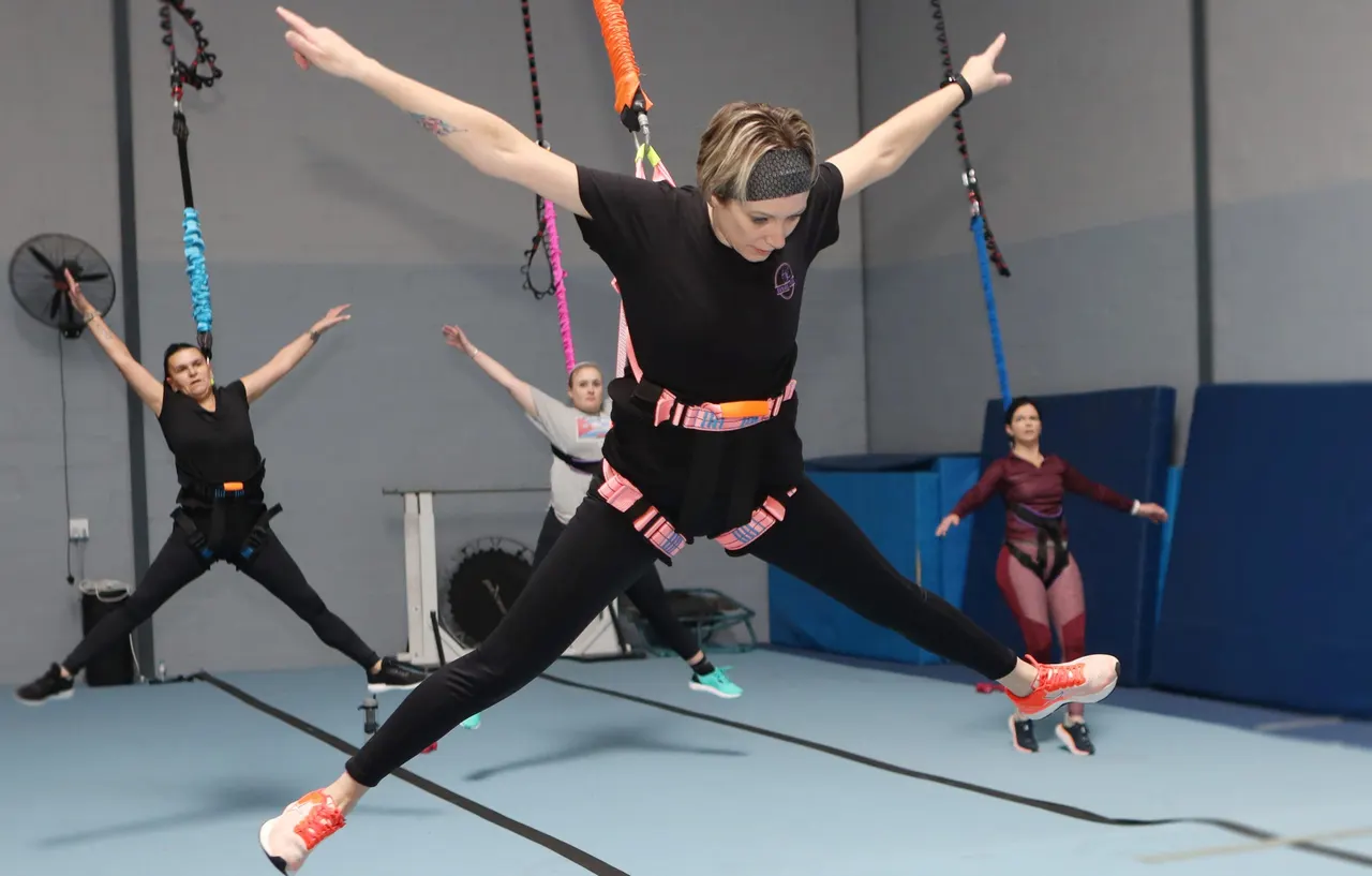 Young participants enjoying a supervised Bungee-Bounce class